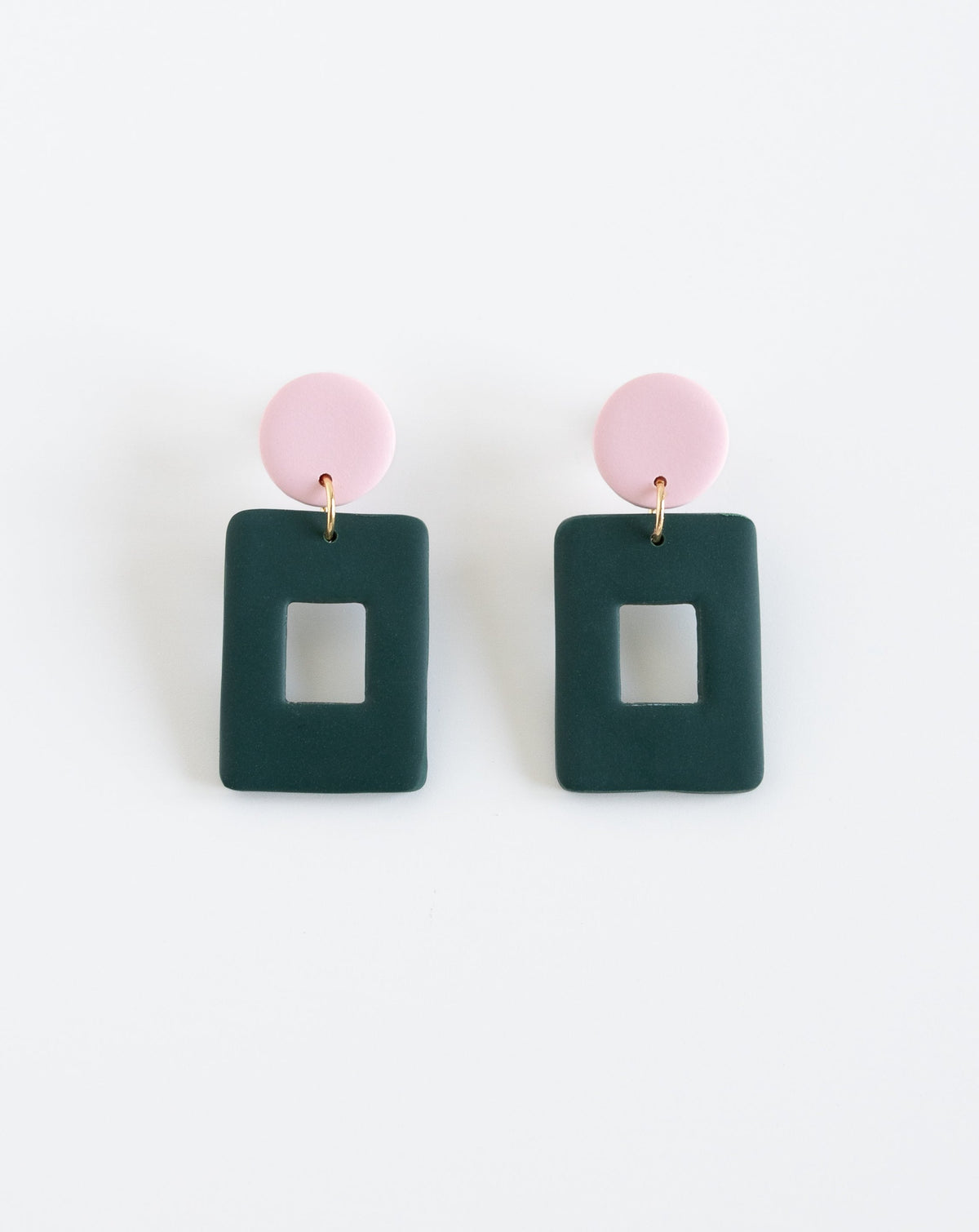 close-up of Muna earrings in Pine color.