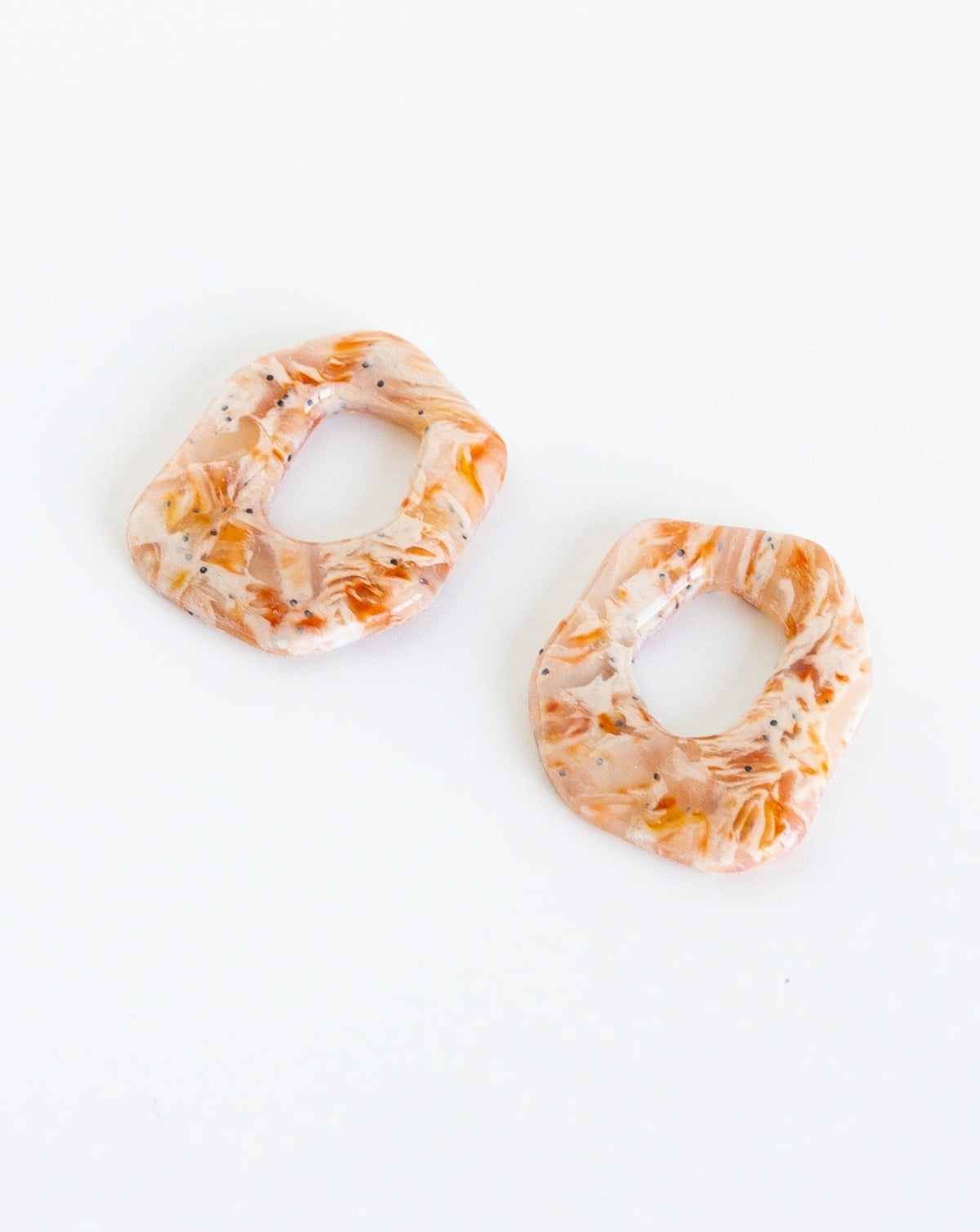 Angled view of Darien Beads in Marble Orange color