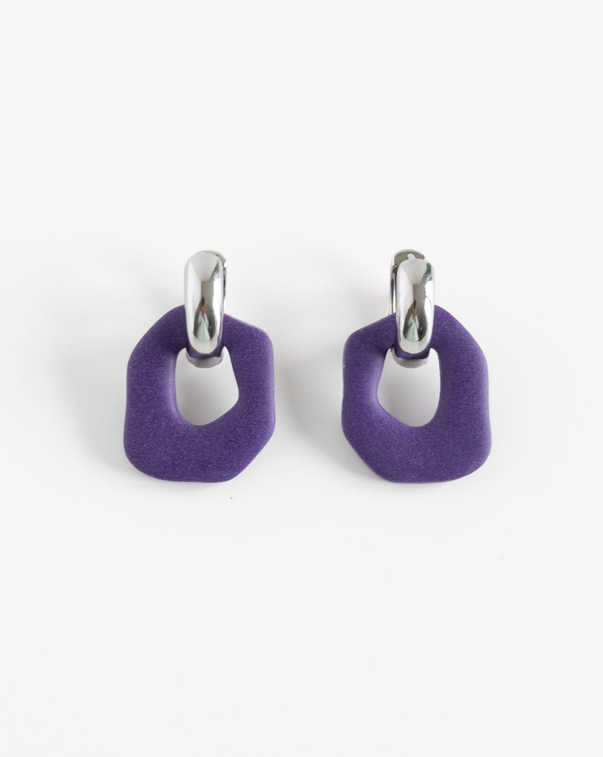 Close-up of Darien earrings in Purple with silver hoops