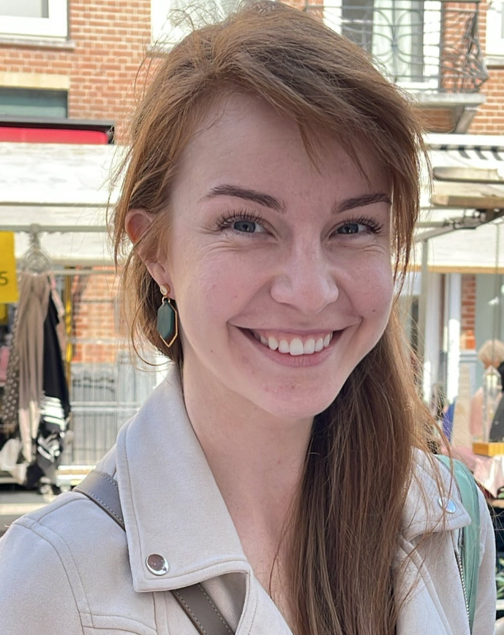 Aisha earrings on customers gold jewelry