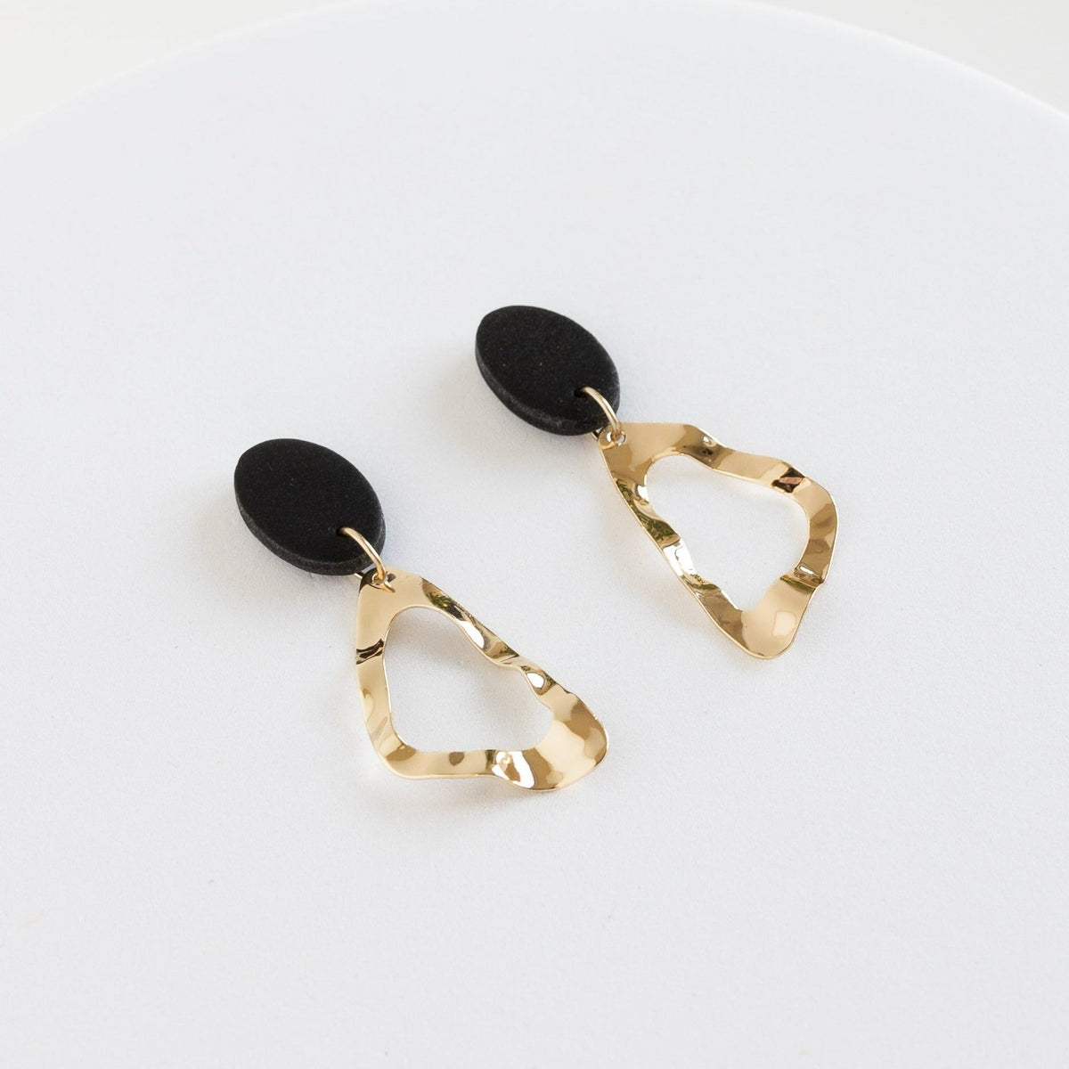 Azita-Clay-Earrings-Black-Gold-Side Angle