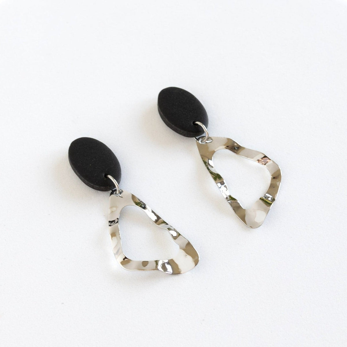 Azita-Clay-Earrings-Black-Silver-Side Angle