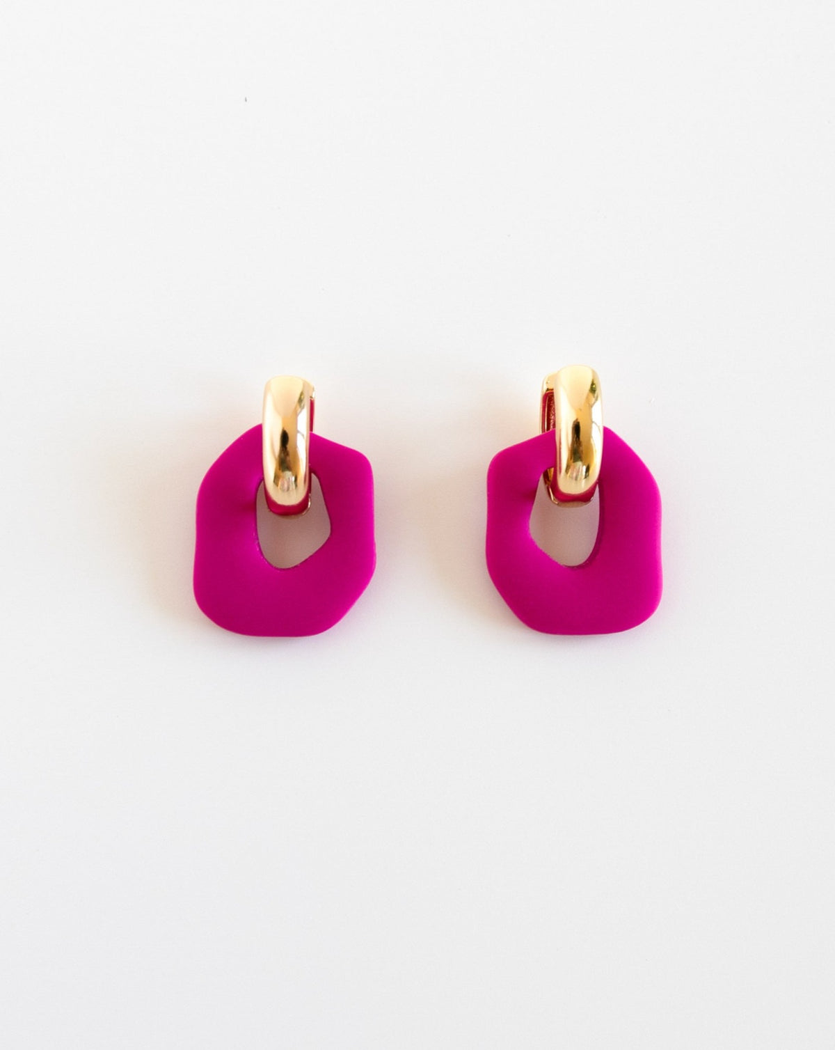 Darien earrings in Fuchsia color with gold hoops, front view