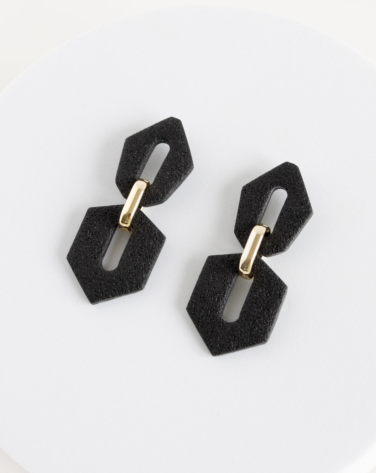 LYHO exclusive design, Shilla earrings in black, angled view.