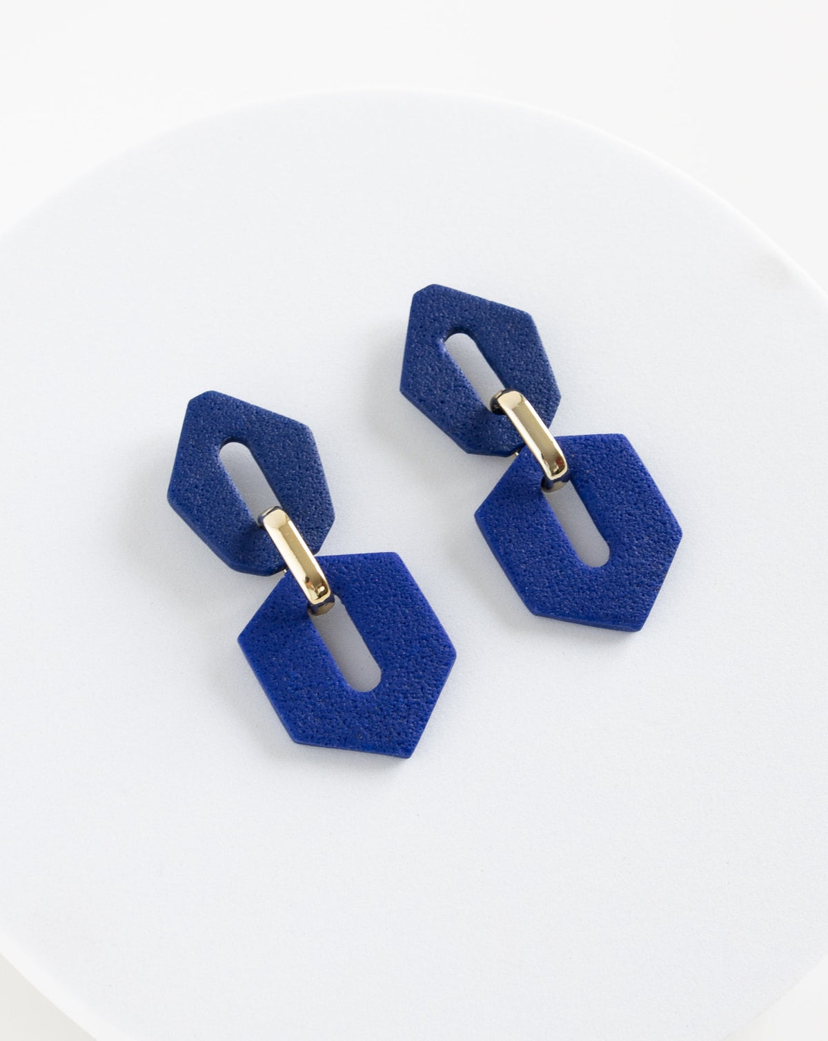 LYHO exclusive design, Shilla earrings in Hue Blue color, angled view.