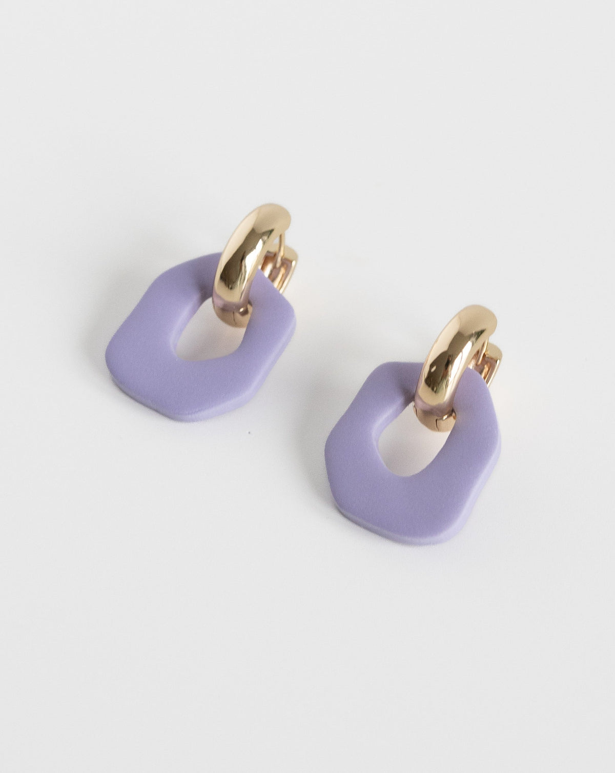 Darien earrings in Lilac color with gold hoops, side view