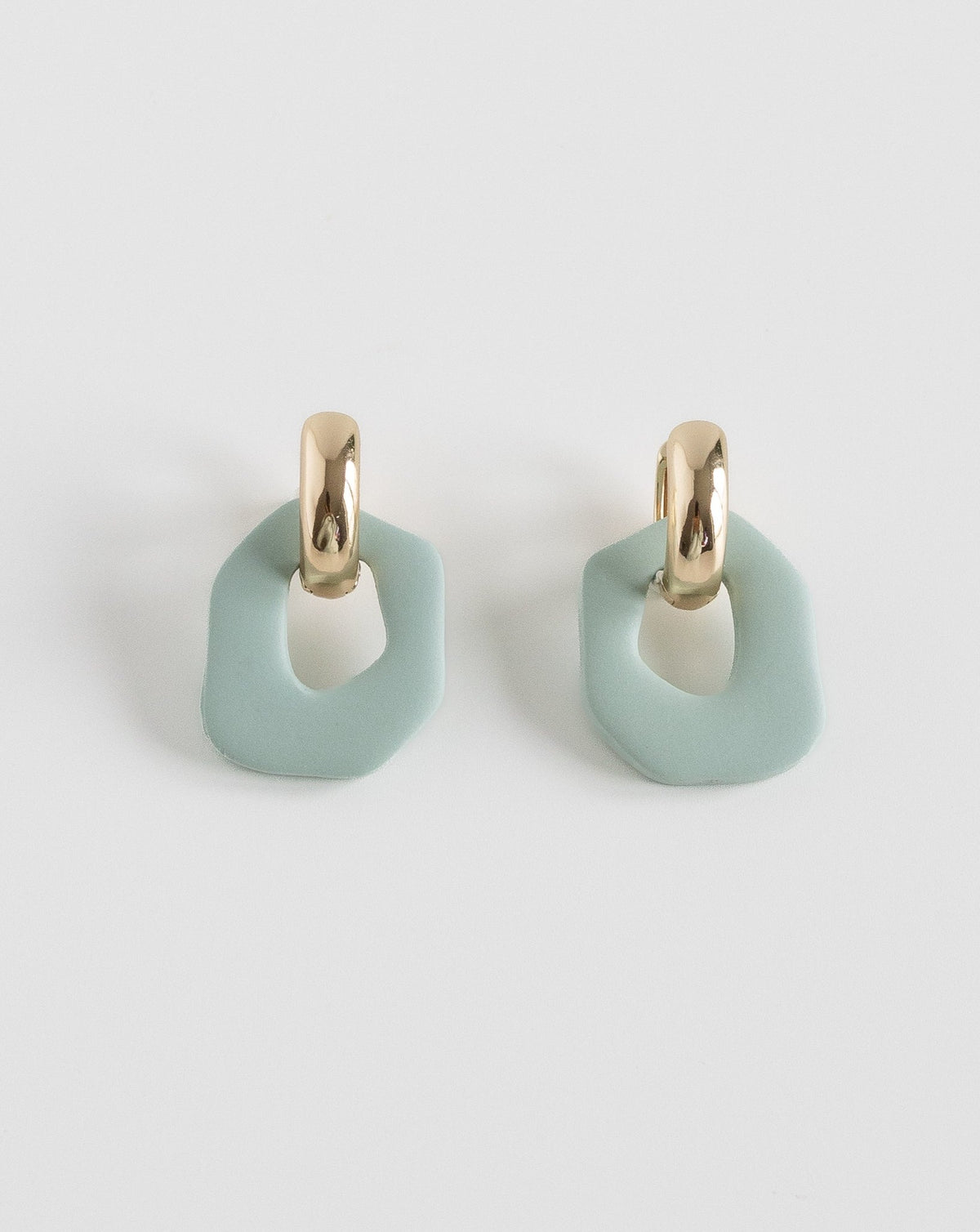 Darien earrings in Sage color with gold hoops, front view