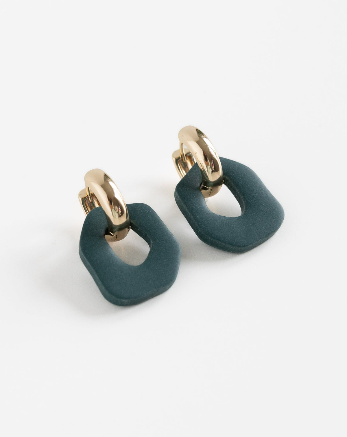 Darien earrings in Pine with gold hoops, side view
