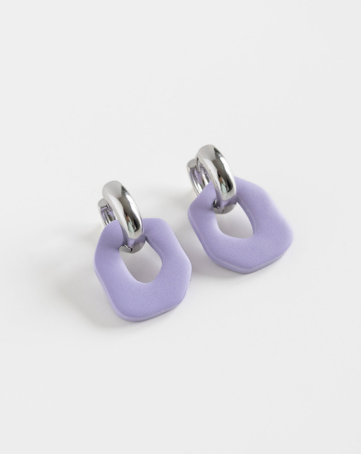 Darien earrings in Lilac color with silver hoops, side view
