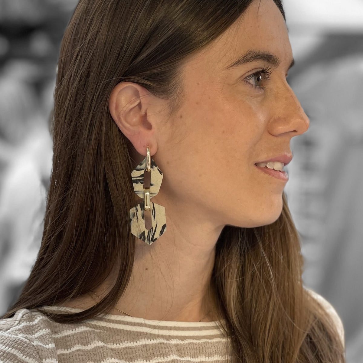Shilla hoops earrings- color marble beige- on a customer