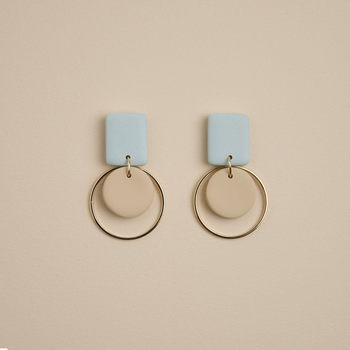 Shiva-earrings-babyblue-gold